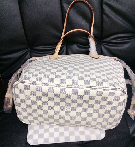 how to spot a fake louis vuitton damier neverfull bag|false louis vuitton.